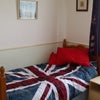 Large Room in Shared Home of Professional Males Main Photo