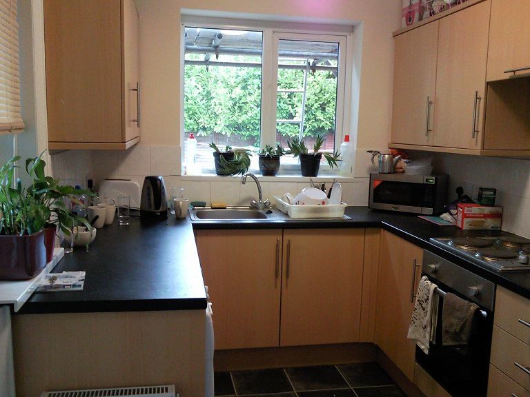 Photo 1: Kitchen