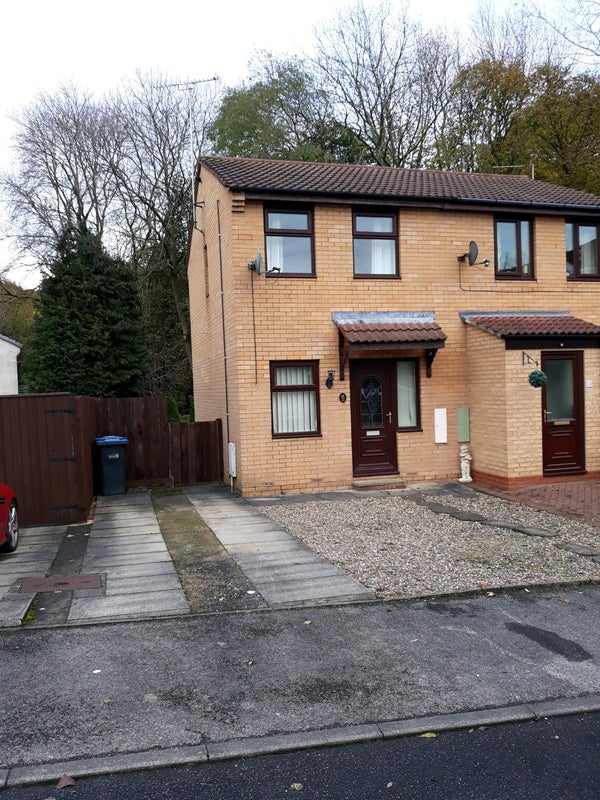 Photo 1: Front parking