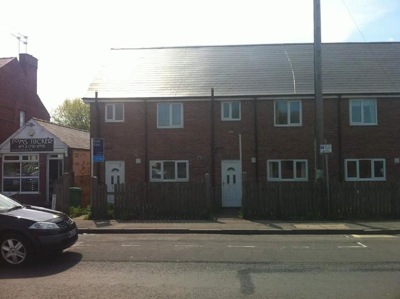 Photo 1: Front aspect