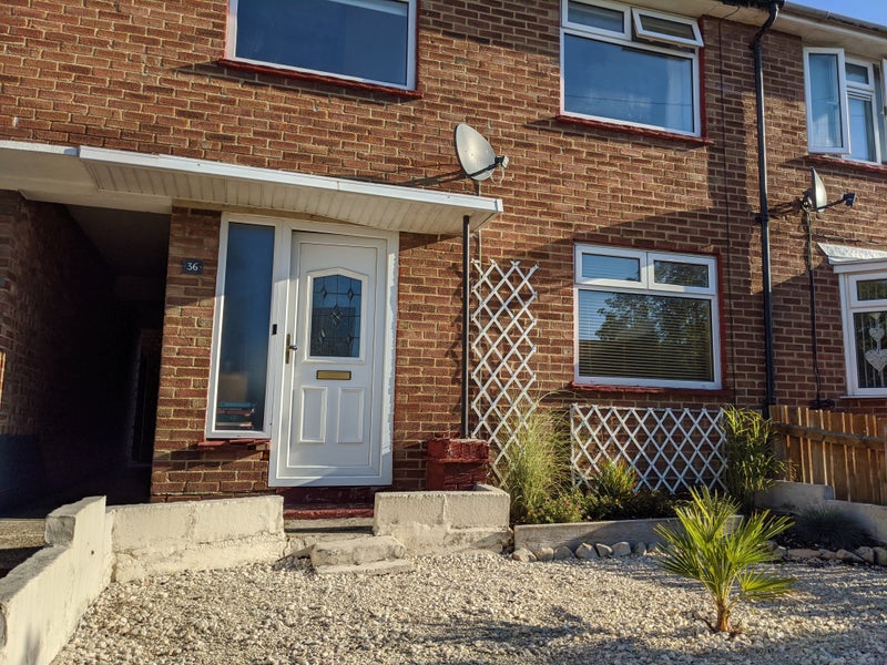 Photo 1: Front of property
