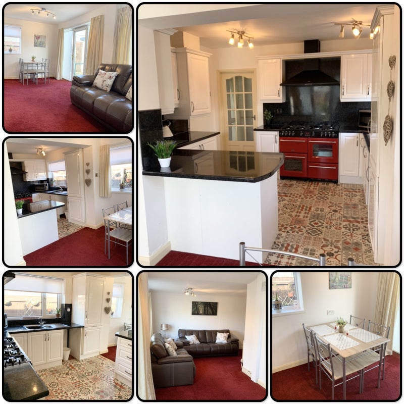 Photo 1: Here is the shared kitchen, dining area and Sitting room with TV