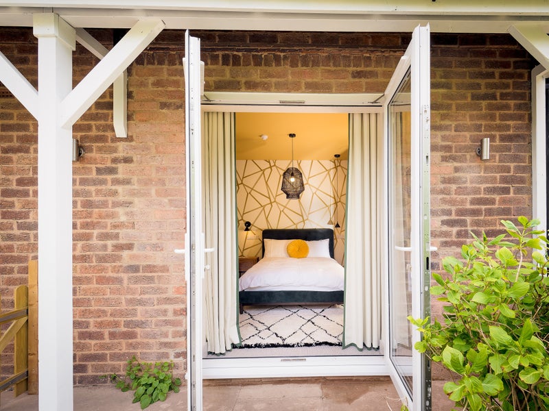 Photo 1: Private Garden with Patio doors