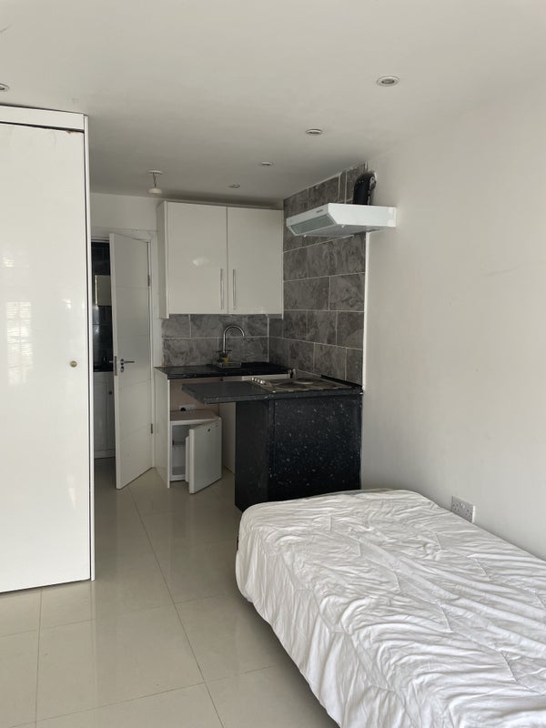 Photo 1: Studio - comes furnished with bathroom , wardrobe, fridge , washing machine, stove.