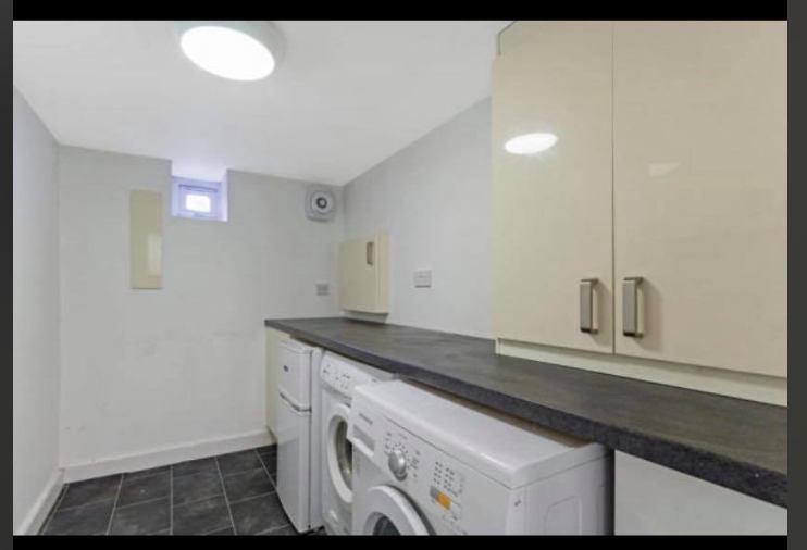 Photo 1: Utility connected to kitchen