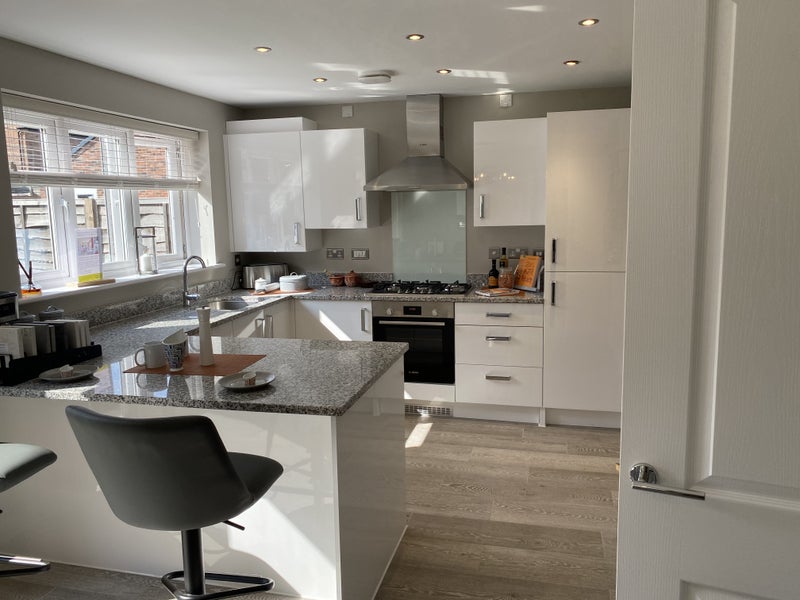 Photo 1: Kitchen open to garden & utility room
