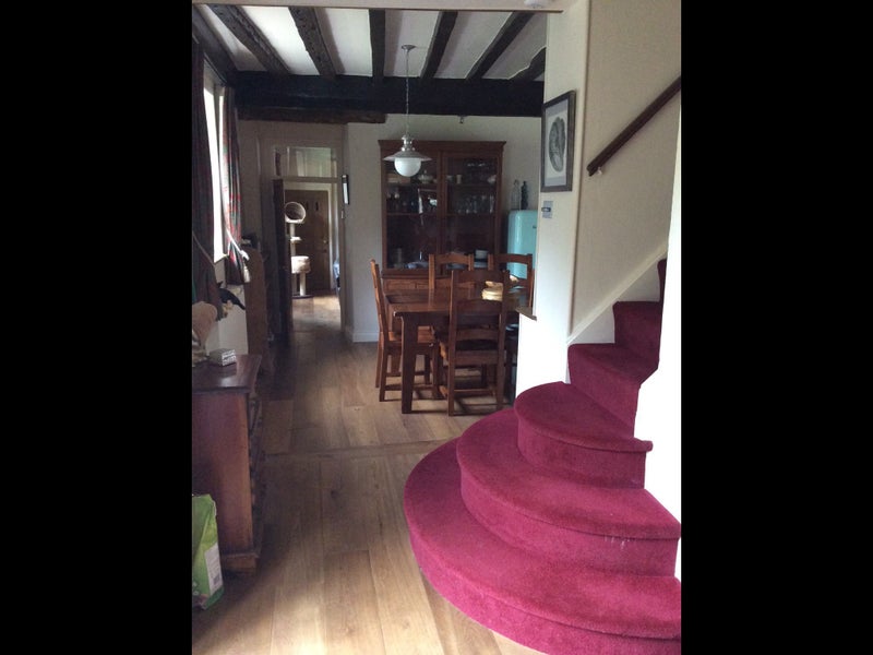 Photo 1: Communal area and stairs to your room