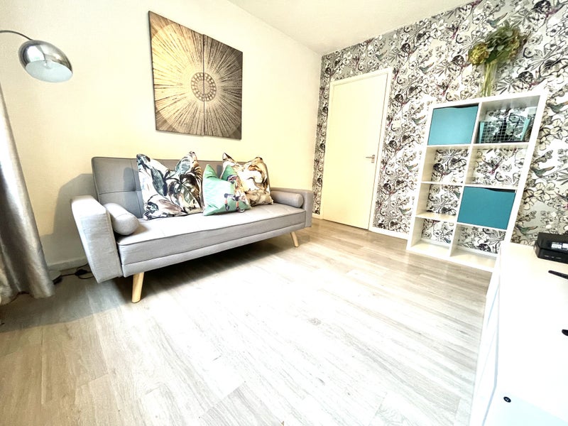 Photo 1: Living Room with Sofa bed