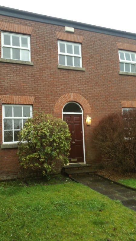 Photo 1: Front view of house