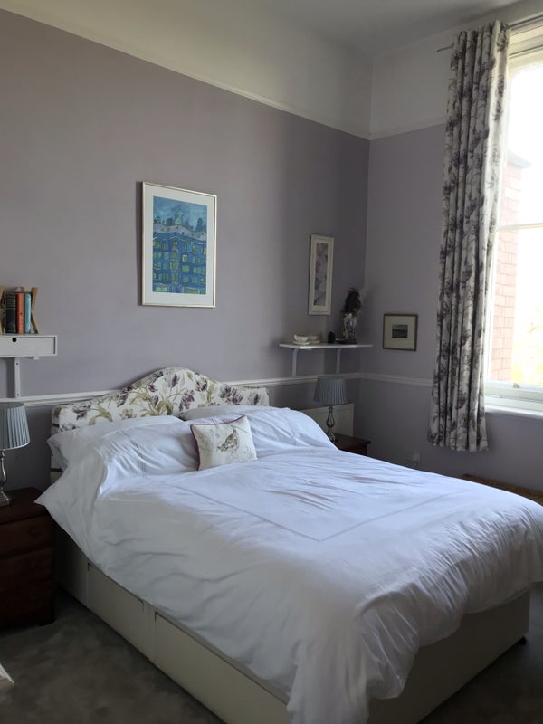 Photo 1: King size bed with bedding provided