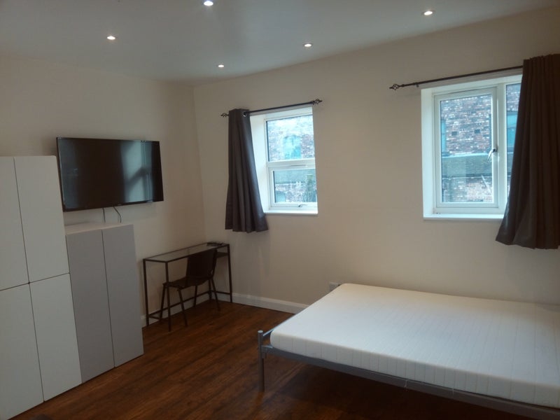 Photo 1: Sleeping Area