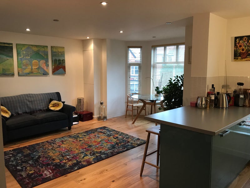 Photo 1: Sitting room / dining area / kitchen