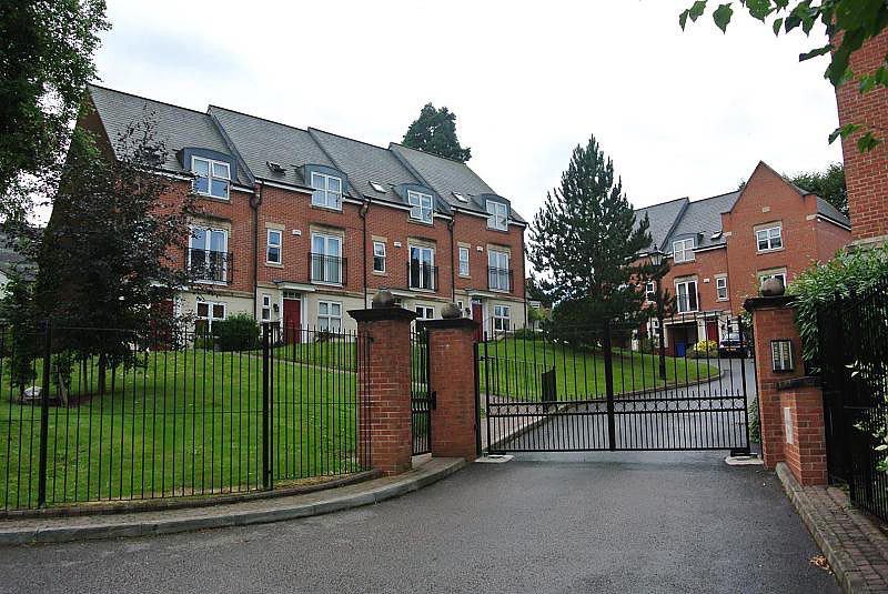 Photo 1: Property is located in a secure gated community
