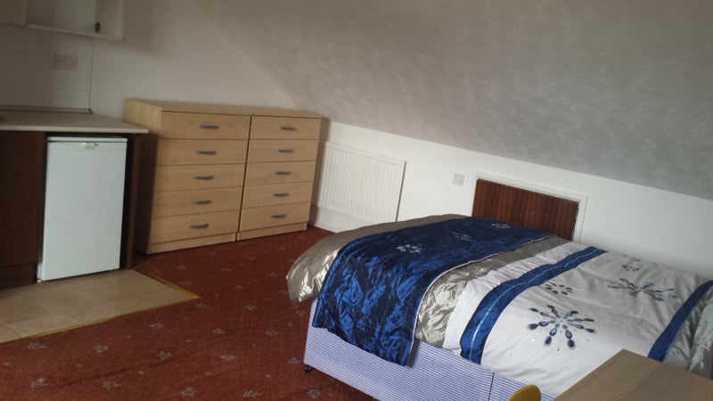 Photo 1: Studio Room