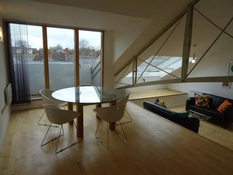 Photo 1: Living space/dining area