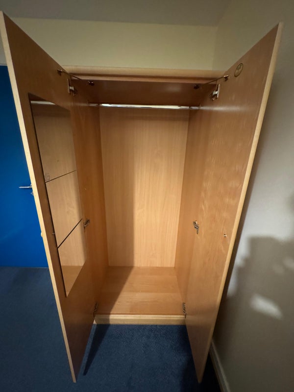 Photo 1: Cupboard with hanger rod