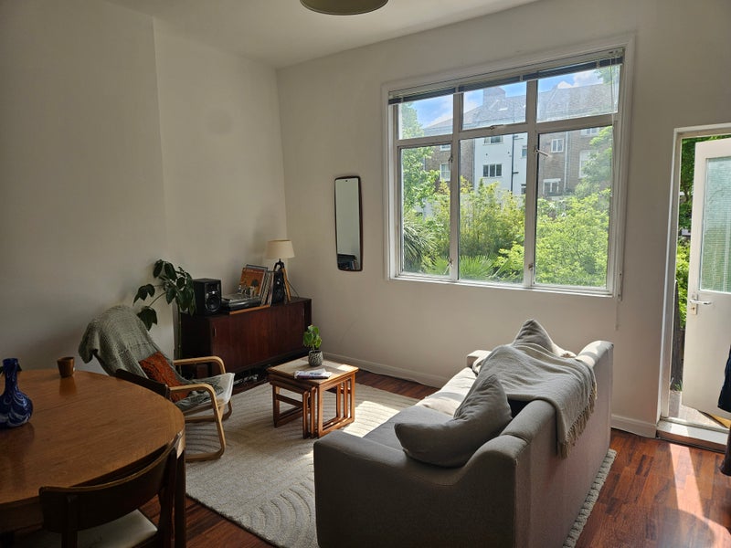 Photo 1: Bright living room!