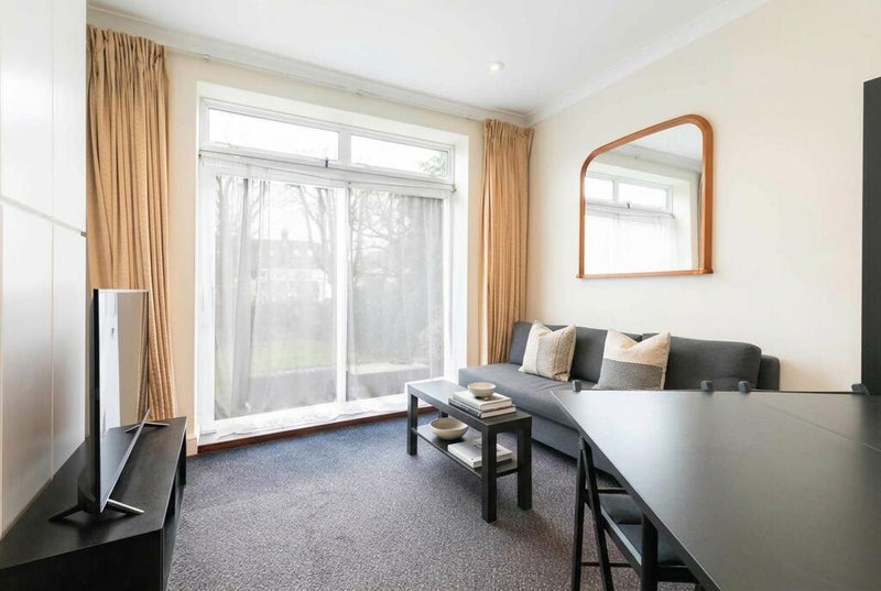 Photo 1: Living Room through to the garden