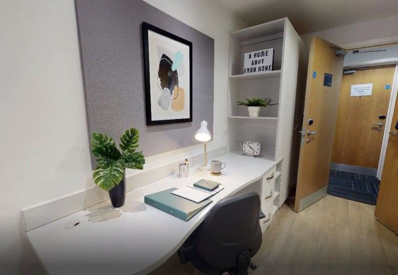 Photo 1: Spacious study desk with private entrance