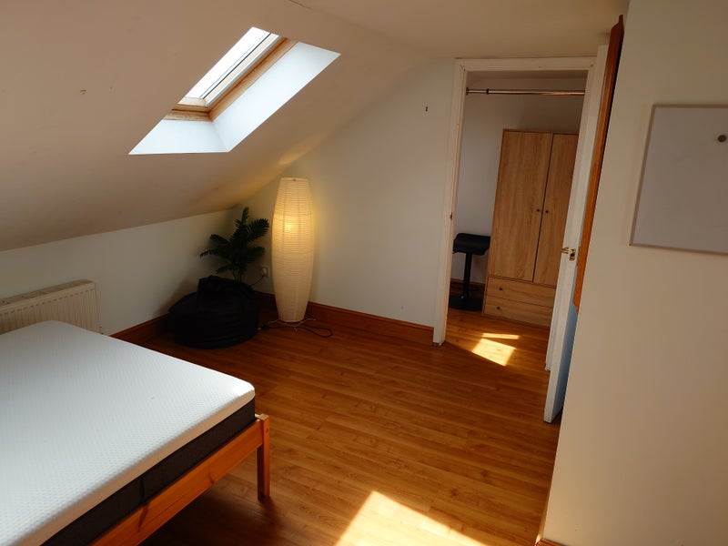 Photo 1: Attic bedroom