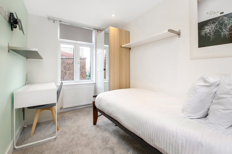 Photo 1: Room 3 - view to bed & window