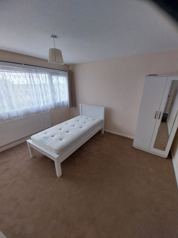 Photo 1: Back Bedroom