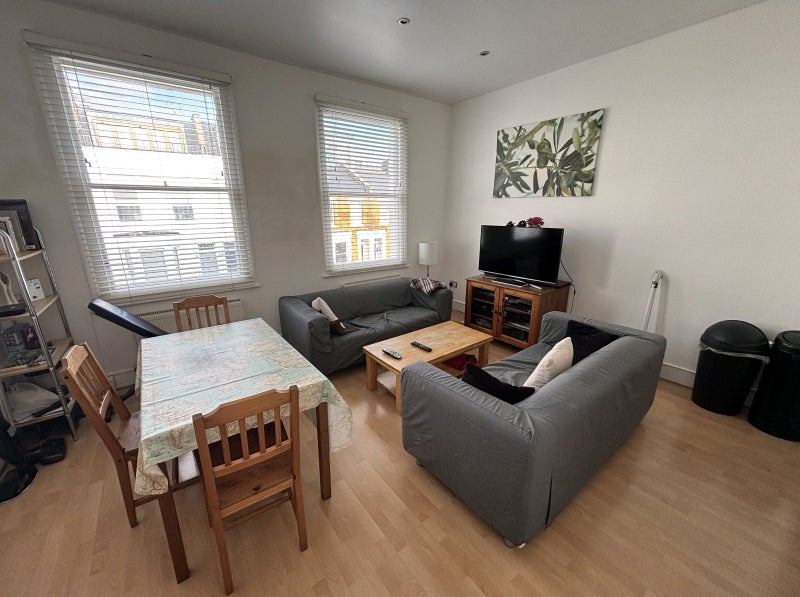 Photo 1: Large living dining area