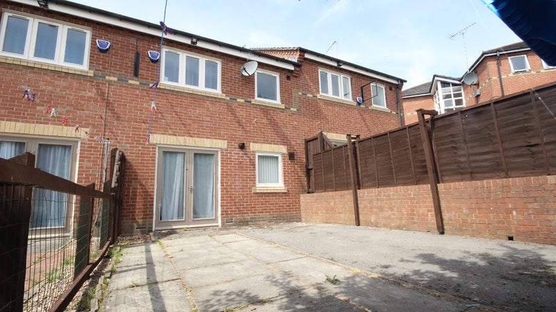 Photo 1: Parking/Rear Patio