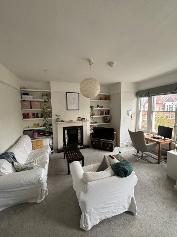 Photo 1: Shared living room 