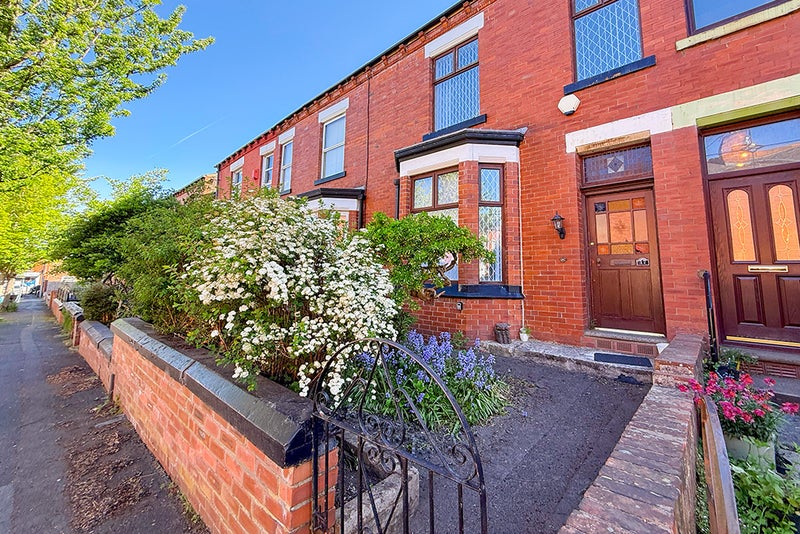 Photo 1: Front of Property