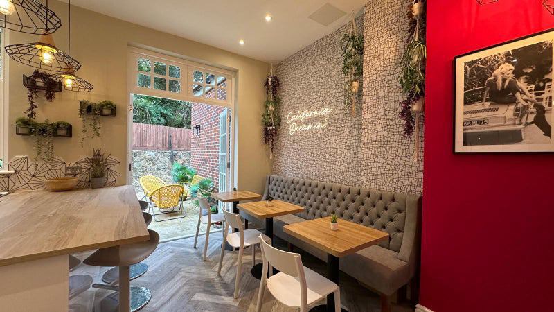 Photo 1: Sociable space cafe style dining area for housemates to enjoy