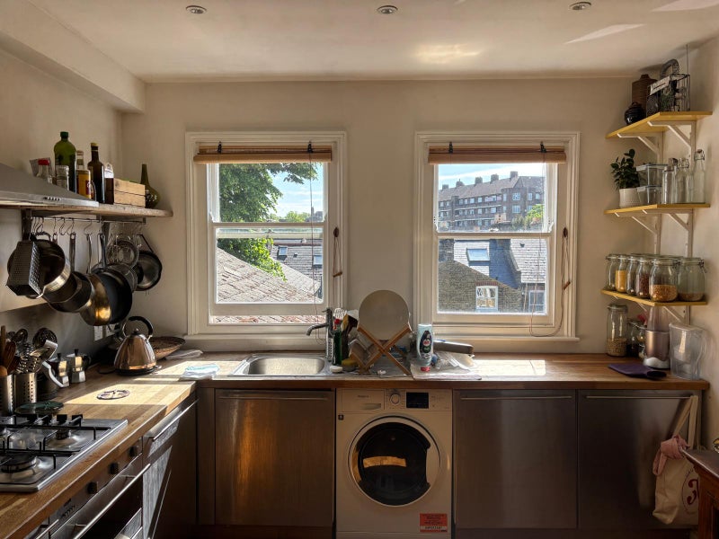 Photo 1: Huge open kitchen, with a big fridge on the right hand side (not in the photo)