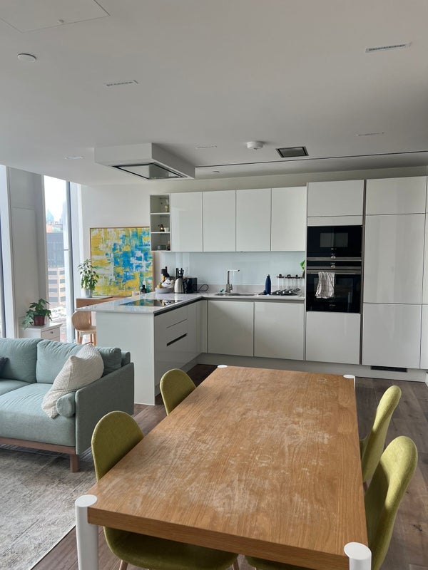 Photo 1: Shared Living Room and Kitchen