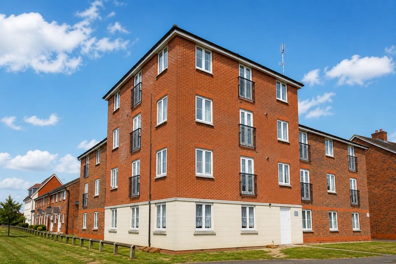 Photo 1: FRONT EXTERIOR OF APARTMENT BUILDING 