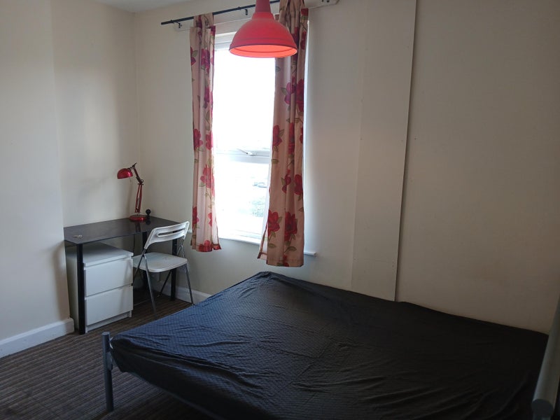 Photo 1: Double Bedroom with shower