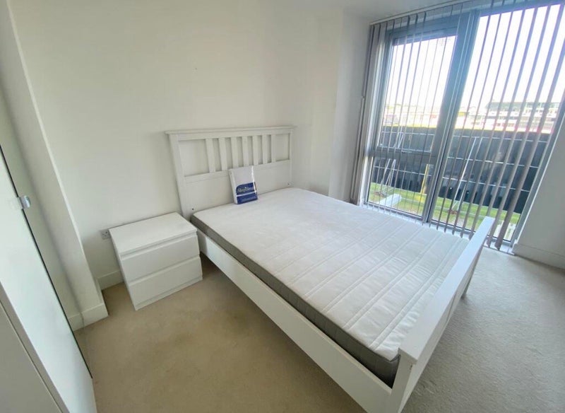 Photo 1: Bedroom with view. (Bed frame, mattress, and dresser are included)