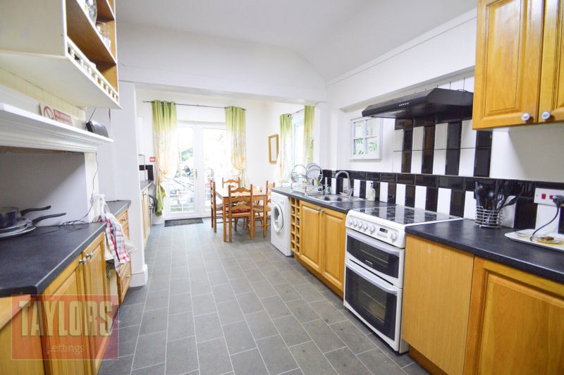 Photo 1: Kitchen & Dining Area