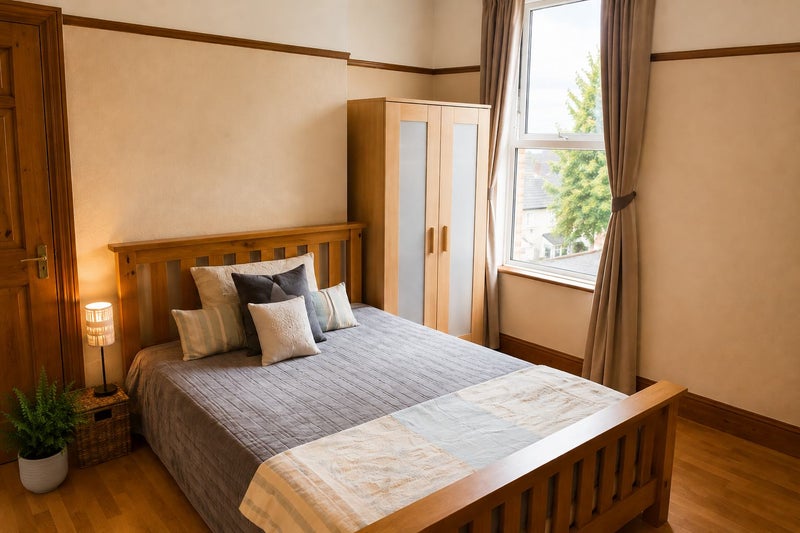Photo 1: Large bedroom 