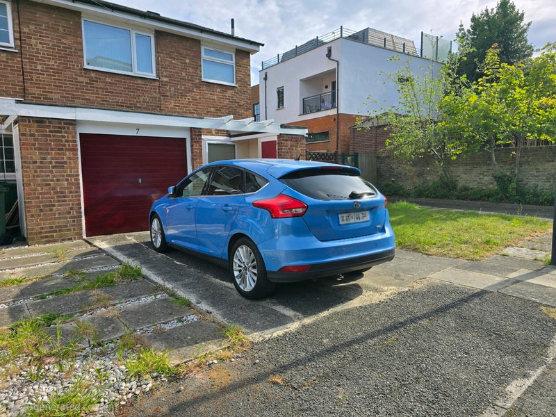 Photo 1: Front parking