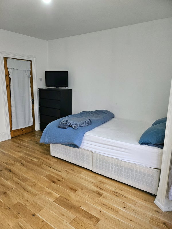 Photo 1: Large room front of house