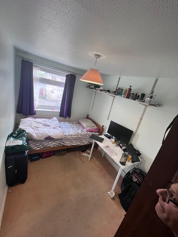 Photo 1: Looking into room towards window