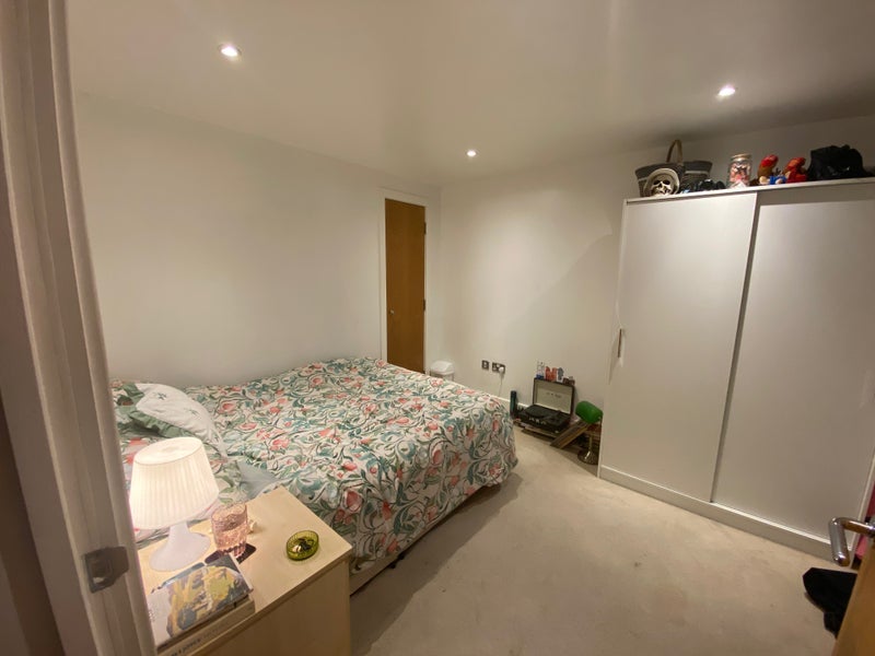 Photo 1: Double bedroom with wardrobe, cupboard and bedside table