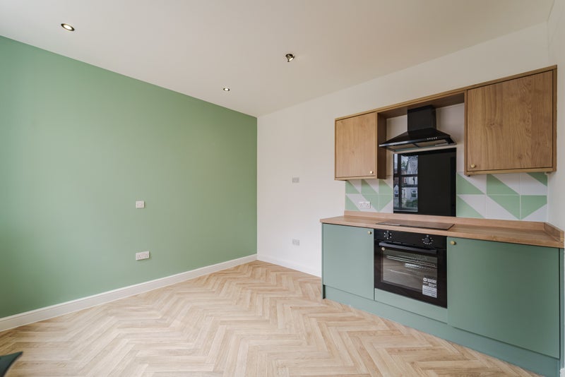 Photo 1: Apartment 2- Kitchen living 