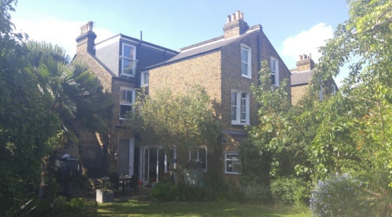 Photo 1: Garden and back of house