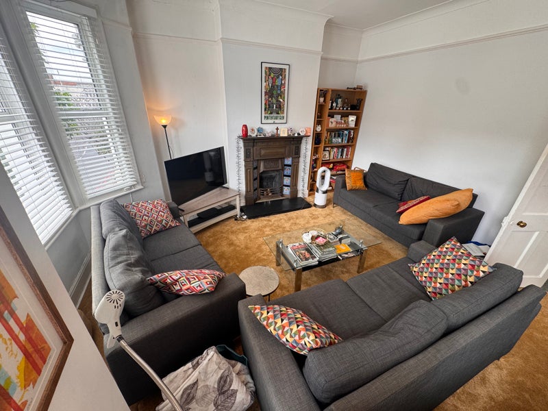 Photo 1: Large Shared Living Room