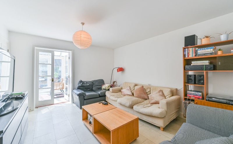 Photo 1: Living room and conservatory