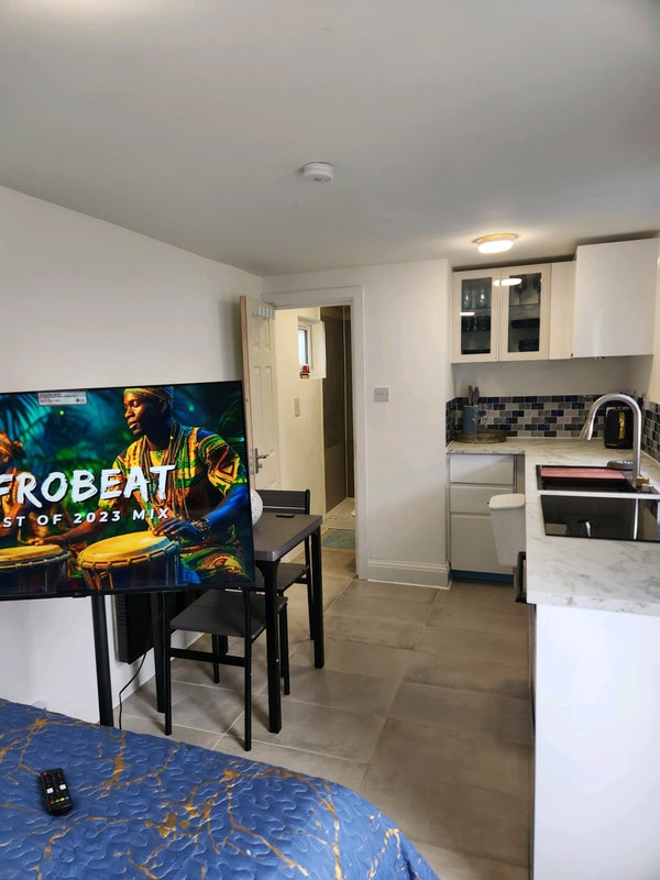 Photo 1: Open plan kitchen