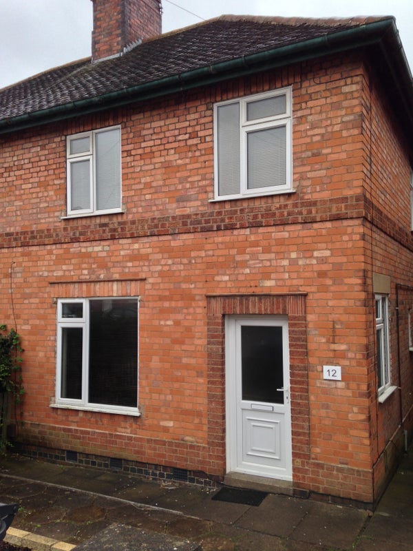Photo 1: Front of property