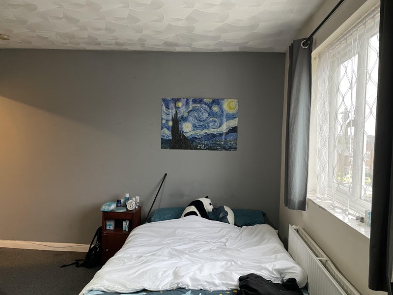 Photo 1: Bedroom with double bed