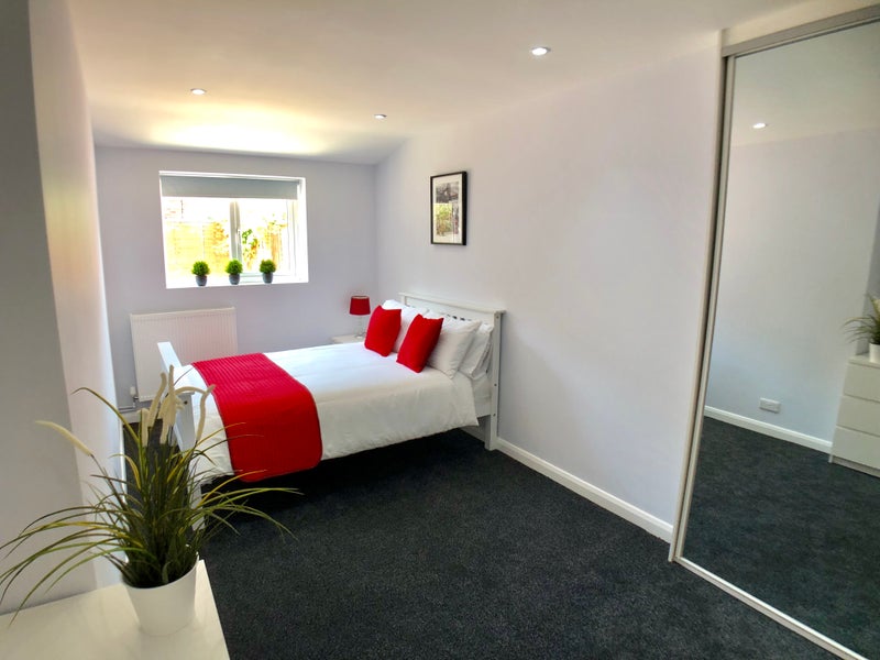 Photo 1: Large double room with wall to ceiling wardrobe 